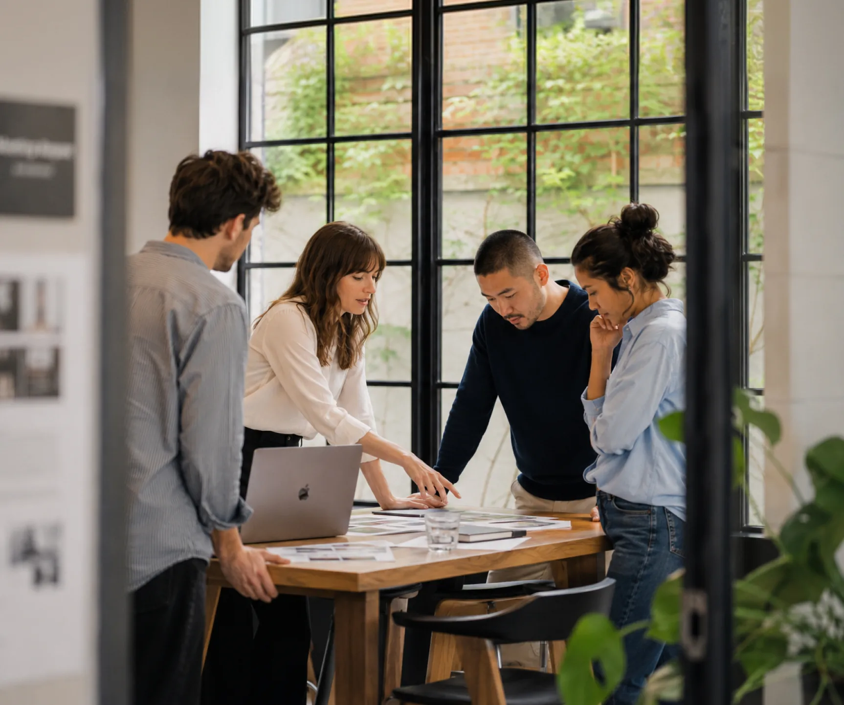 Business strategy team collaborating around a table