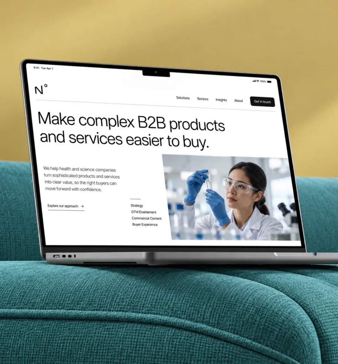 A product website displayed on a laptop against a health & science b2b themed interior.